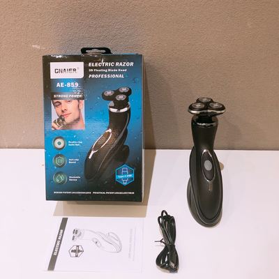 चेहरे के उपयोग के लिए स्टेनलेस स्टील ब्लेड और प्लास्टिक हैंडल वाला पोर्टेबल पुरुषों का इलेक्ट्रिक शेवर