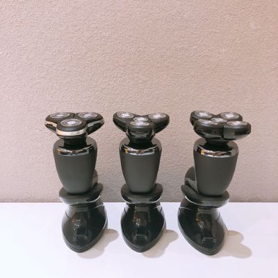 चेहरे के उपयोग के लिए स्टेनलेस स्टील ब्लेड और प्लास्टिक हैंडल वाला पोर्टेबल पुरुषों का इलेक्ट्रिक शेवर