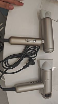 सैलून और घर के उपयोग के लिए BLDC मोटर और आयनिक तकनीक के साथ पेशेवर फोल्डेबल हेयर ड्रायर